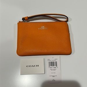 🌸NEW COACH WRISTLET CORNER ZIP-BRIGHT MANDARIN CROSSGRAIN LEATHER NWT.